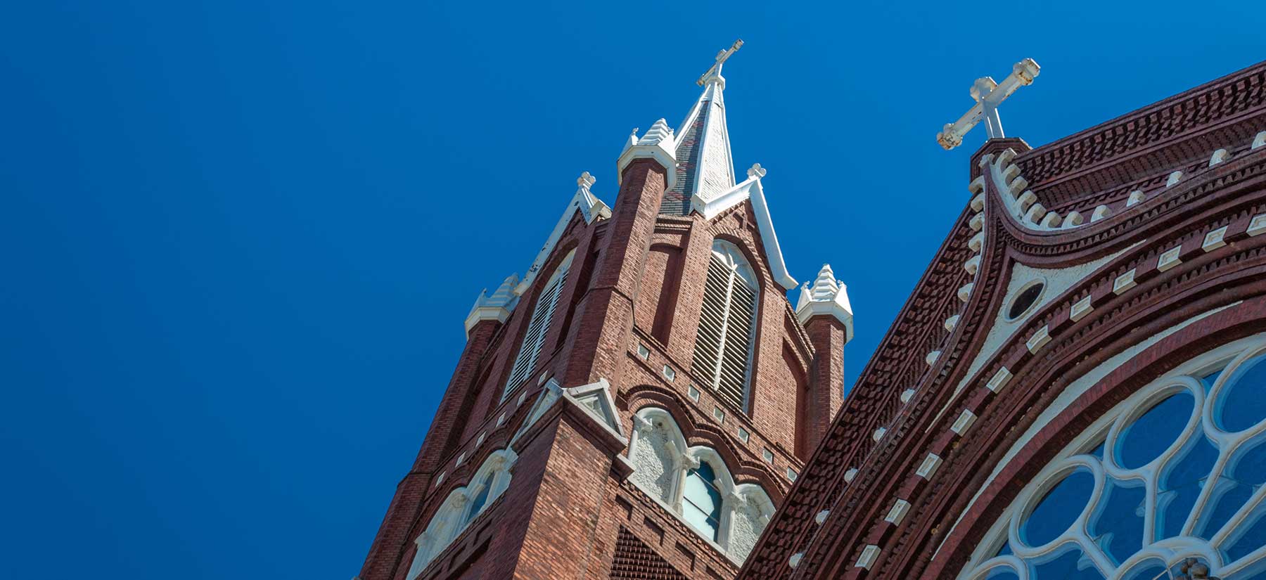 church building viewed from ground level while looking up toward the sky