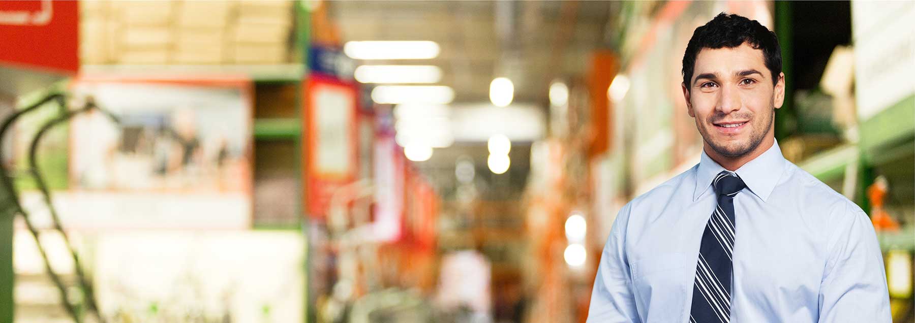 man standing in warehouse