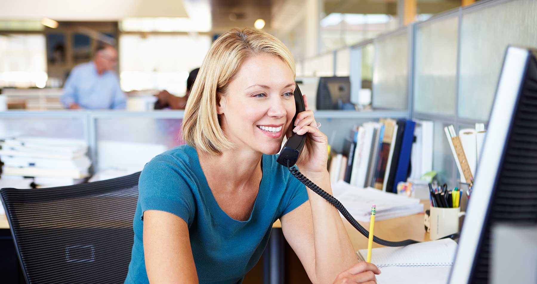 girl smiling and talking on phone